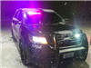 Patrol Vehicle on a Snowy Night