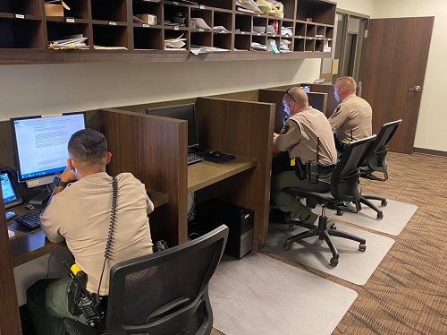 Patrol Officers at Computer Terminal
