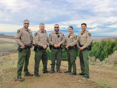 Patrol Officers in a Field